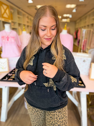 Mineral wash hoodie with star embroidered patches. 