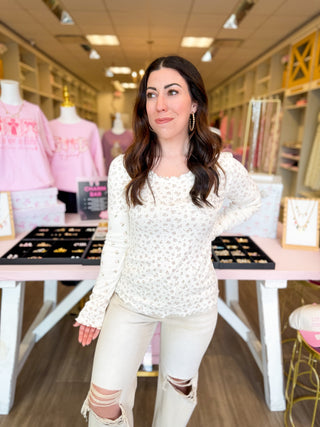 Sweet Meadow Long Sleeve Top in cream with dainty green and blue floral print, ribbed knit fabric, and lettuce-trim 
