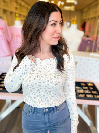Sweet Meadow Long Sleeve Top in cream with dainty green and blue floral print, ribbed knit fabric, and lettuce-trim 