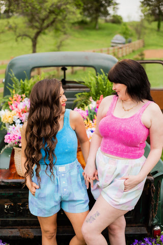 Ribbed tank tops in blue or pink. Perfect on their own or layered. 