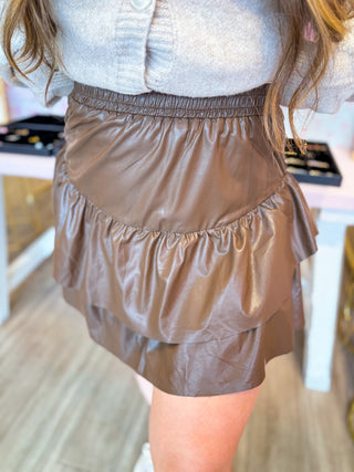 Brown faux leather skirt. Perfect for alll fall outings. 
