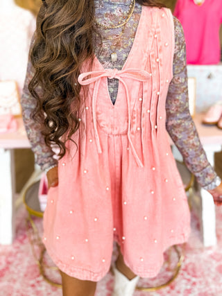 Peachy orange  corduroy romper with pearl details and bow tie front – Bailey Kate Boutique