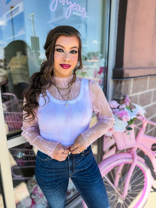 Romantic sheer lace long sleeve top layered over a ribbed tank. Available in pink & blue at Bailey Kate Boutique. Perfect for date nights, girls’ night out, or everyday chic.