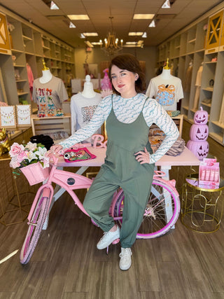 Sage green jumper with cute ruffle design 