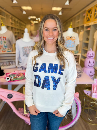 White sweater with big sequin game day letters 