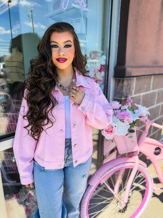 Light weight embroidered jacket with floral and bow design. 