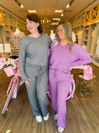 Two piece set on gray or lavender. Super soft material with draw sting pants and perfect for cool days. 