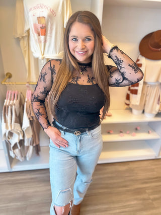 Sheer lace top for layering. 