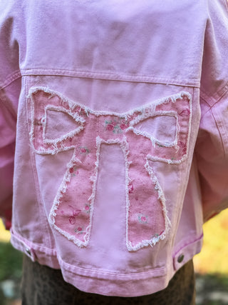 It’s all in the details with this embroidered floral and bow jacket 