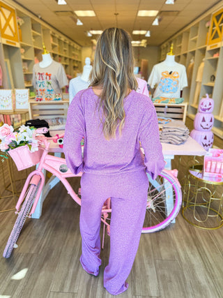 Two piece set on gray or lavender. Super soft material with draw sting pants and perfect for cool days. 